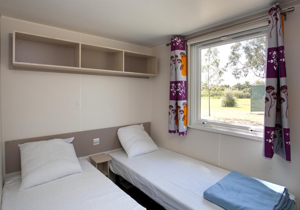 Camping Miami Plage Hotel Poggio Mezzana Стая снимка